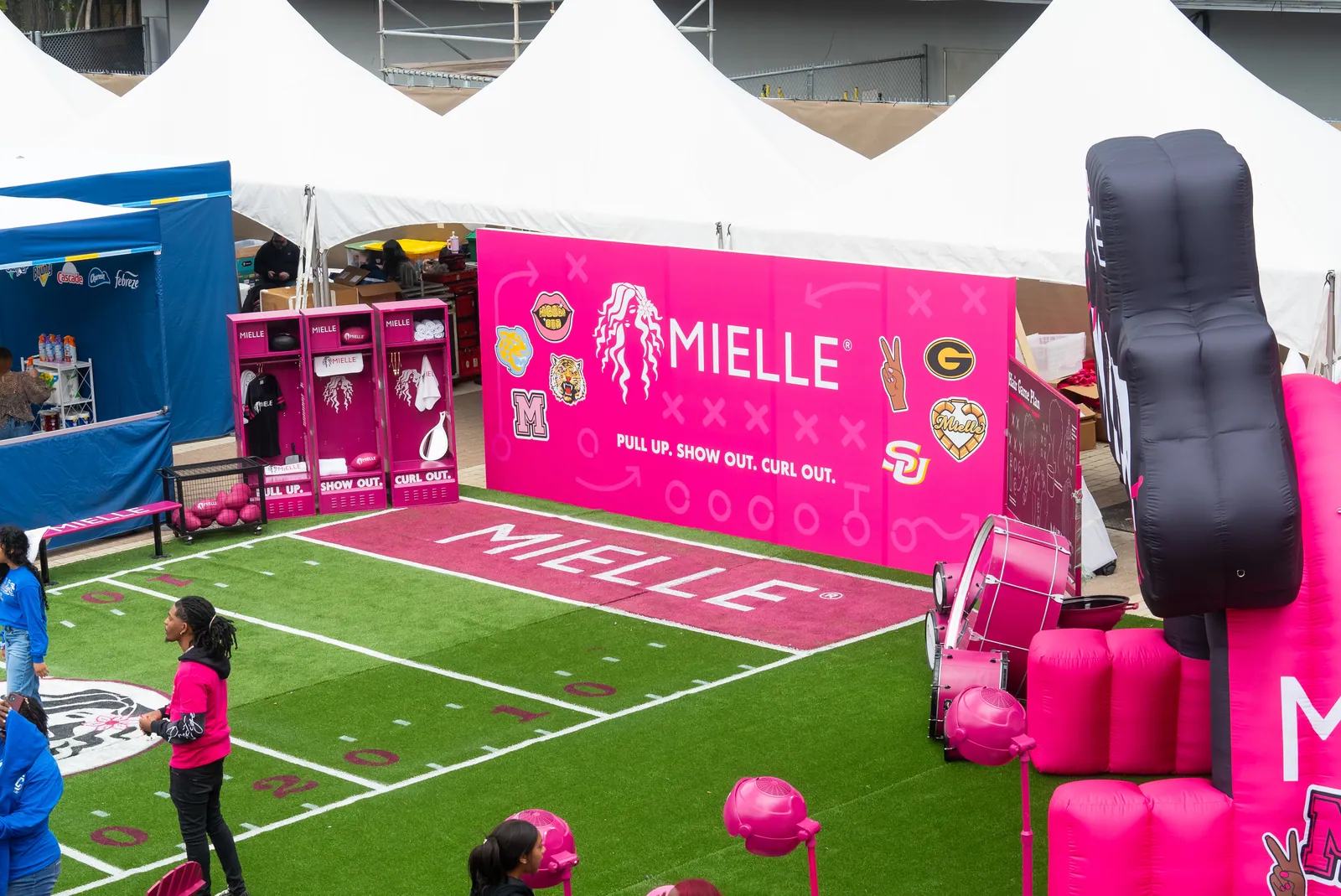 Mielle brand activation build-out on a football field